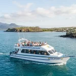 Speedboat ferry navigating between Santa Cruz and Isabela islands in Galapagos.